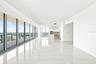 The wall of floor to ceiling windows maximize the view.