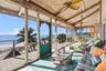 42 foot long front porch overlooking the Gulf of America