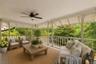 Virtually staged second level Covered Porch located off of the Primary Bedroom Ensuite.