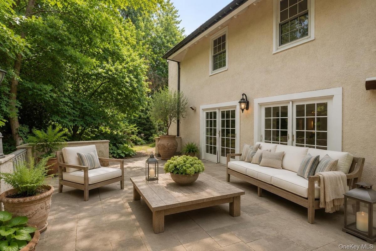 Virtually staged Veranda located off of the Sunroom.
