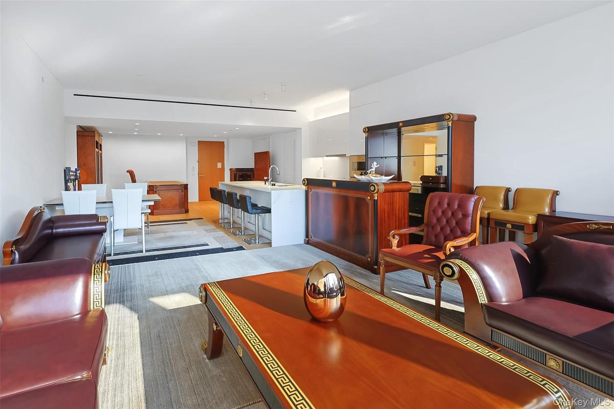 Open-concept living space featuring wood-finish flooring, From Kitchen and Living Room