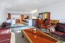 Open-concept living space featuring wood-finish flooring, From Kitchen and Living Room