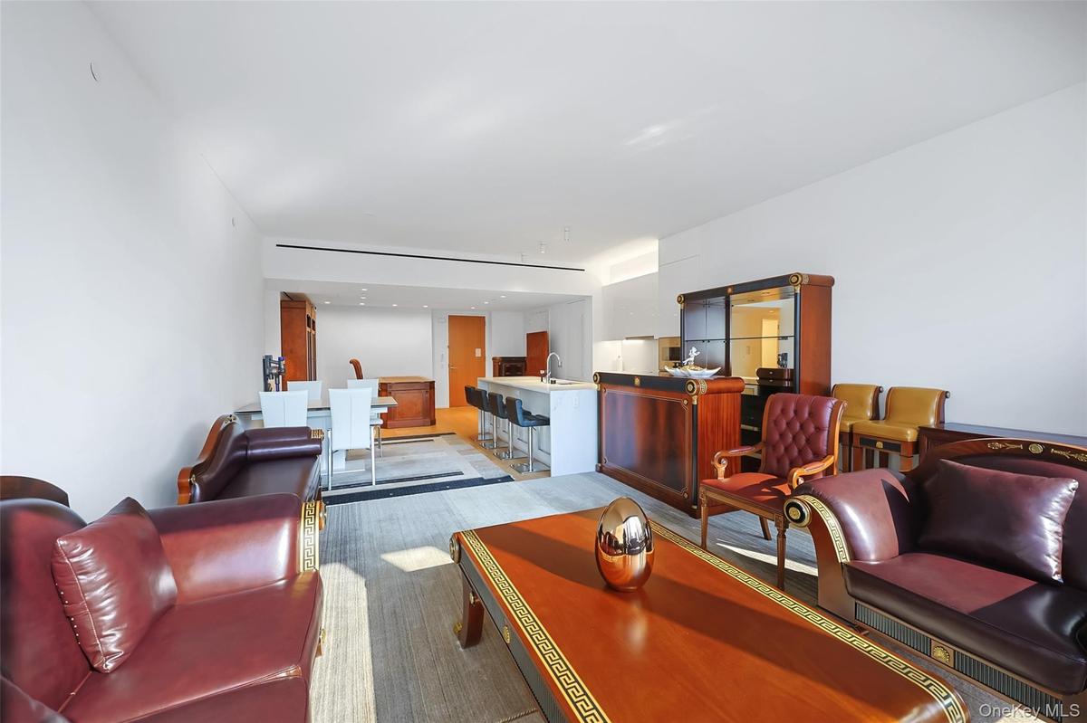 Open-concept living space featuring wood-finish flooring, From Kitchen and Living Room