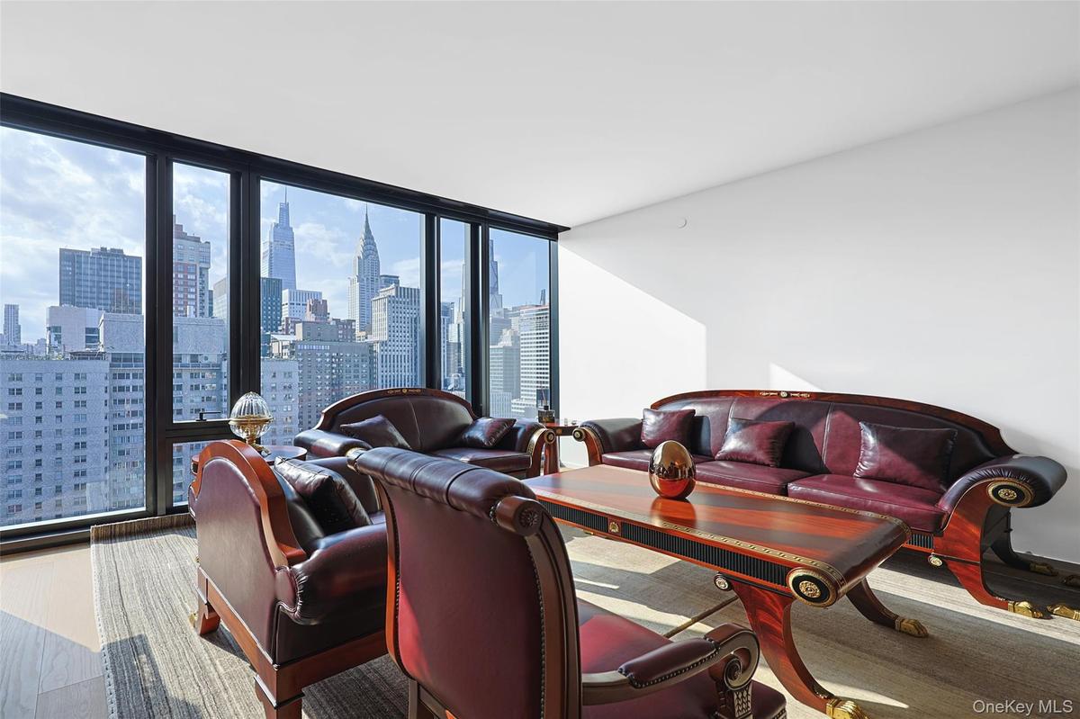 Floor-to-ceiling windows with expansive city scenery