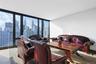 Floor-to-ceiling windows with expansive city scenery