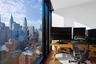 Second Bedroom View with Floor-to-ceiling windows with expansive city scenery