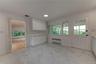 Eating area in Kitchen, opens to a covered porch for summertimeentertaining