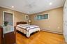 One of Two Primary Bedrooms in this Home! Main Level Primary has Triple Closets and Gleaming Hardwood Floors.