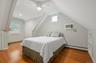 Romantic Queen Size Bedroom on Second Floor with Exquisite Architectural Details.