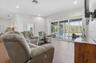Living Room with triple double pane recessed sliding doors