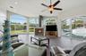 Expansive views of the spring fed pond and pool from the Great Room