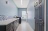 Laundry Room is right off the kitchen