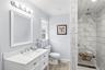 Stunning new spa like primary bathroom with walk in shower.