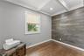 Bedroom 3 with beamed ceiling.