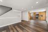 View from Family Room looking into Kitchen and back staircase.