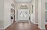 Foyer that opens to the dining room and front living room.