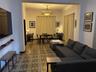 1st floor with French doors closed and curtains.