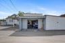 West side of main office storage with garage and remote opener