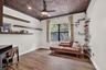 Ornate patterned ceiling with integrated lighting and ceiling fan