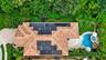 Terracotta tile roof with integrated solar panels