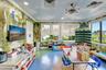 Specialty room featuring custom wall and ceiling murals