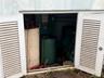 The generator room is separate - generator is not functional, but plenty of room for a new generator or solar battery system.