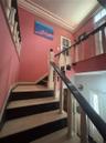 Marble and Granite Stairway to the second floor gallery. Elevator door is at the top of the stairs.