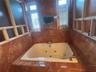 Primary Bathroom spa tub.