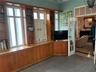 1st Floor Bonus Room with built-ins and private entrance to the horseshoe driveway and pool area.