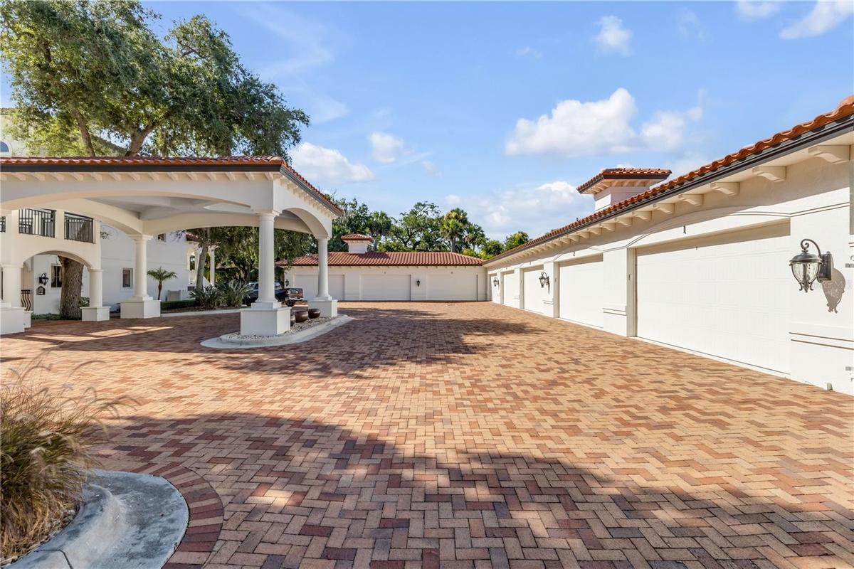 Paver parking lot, private garage, portico