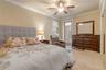 Guest Bedroom with exterior door to pool area
