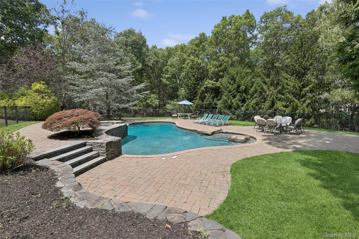 Free form gunite pool with spa