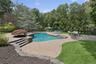 Free form gunite pool with spa