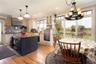 Kitchen with butcher block counters, a healthy amount of sunlight