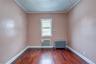 3rd bedroom, view of backyard