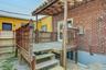 Backyard porch/ back entrance to basement