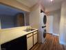 Kitchen with laundry area