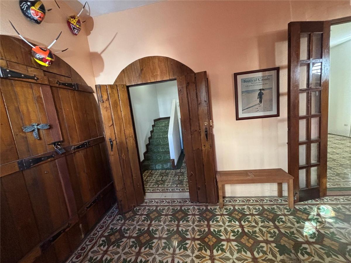 Lobby has separate entrances for the garage (left), stairway (center) and family/great room (right).