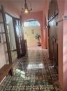 Entry Foyer - arch at the end leads to a passageway to the private entrance for the in-law suite/2nd primary bedroom.