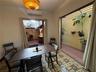 1st floor great room with French doors open to terrace and in-law suite courtyard/kitchen. Great for entertaining!
