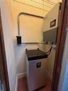 Solar battery and Inverter located in 1st floor half bathroom/utility closet.