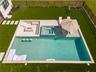 Pool with spa and fire pit
