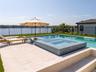 Pool with spa and fire pit