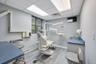 Dedicated clinical space featuring recessed lighting, paneled ceilings, and wood-finish flooring
