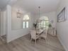 The formal dining room is just off the kitchen to make serving those special meals a breeze