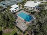 The Waterford Sports Club pool is junior olympic sized and includes a heated spa with plenty of seating for everyone