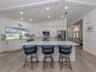 This large modern kitchen is the heart of this home