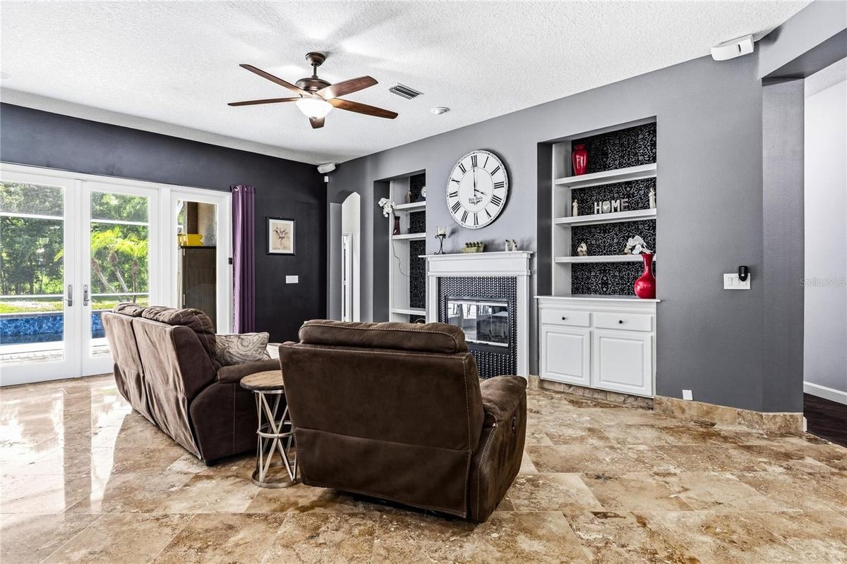Travertine floors accent the living areas!