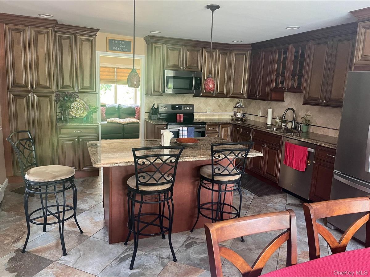 Renovated Kitchen with Island and tons of storage.