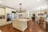 Eat in kitchen with glass doors open to family room